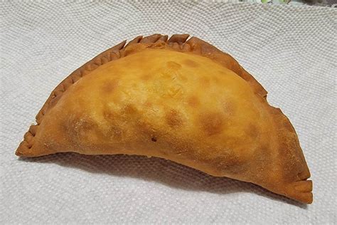 Pikalo empanadas - Pikalo is a cozy counter-serve eatery located at 378 Centre St, Jamaica Plain, Massachusetts, 02130. Offering a delightful blend of Dominican flavors, this orange-hued restaurant specializes in a variety of dishes such as empanadas and patacones.